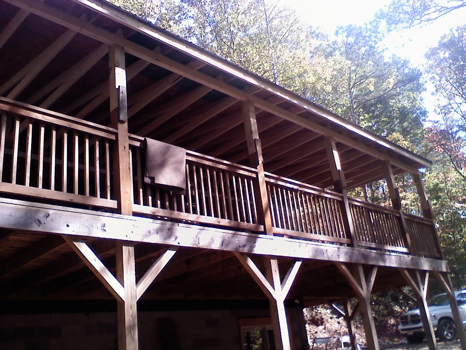 Timber framing under a new elevated porch and deck — Roof Leak Repair in Moab by Roofing Brothers